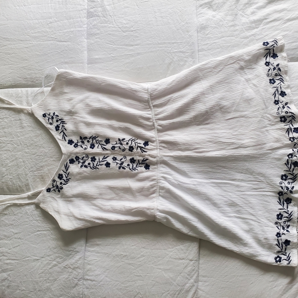 White Romper with Blue Floral Embroidery